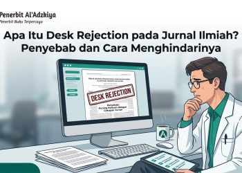 Peneliti kecewa melihat cap Desk Rejection naskah jurnal di komputer.